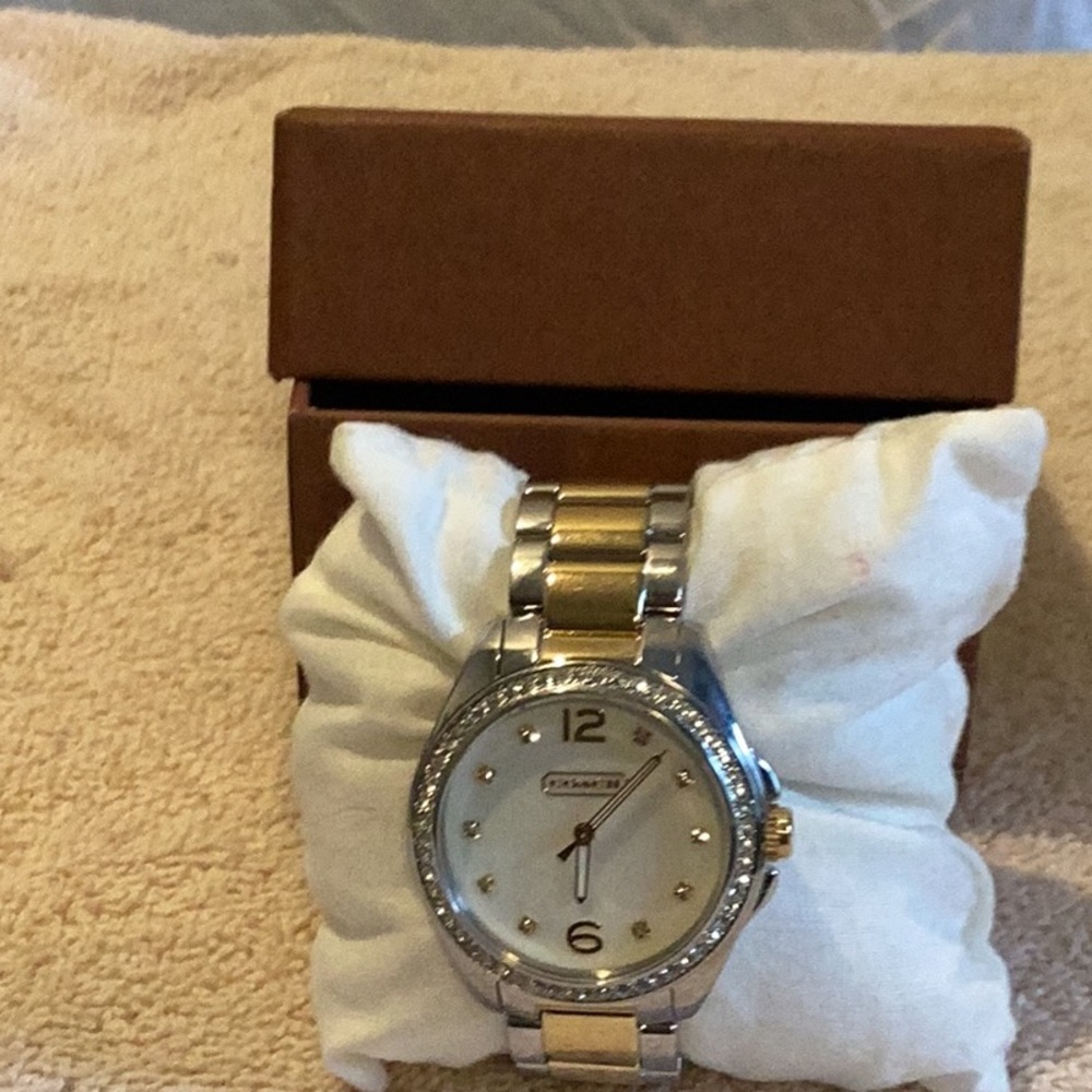 Coach mother of pearl & diamond face women’s watch